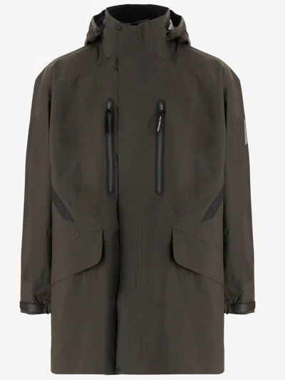 And Wander Technical Jacket With Hood And Multiple Pockets In Green