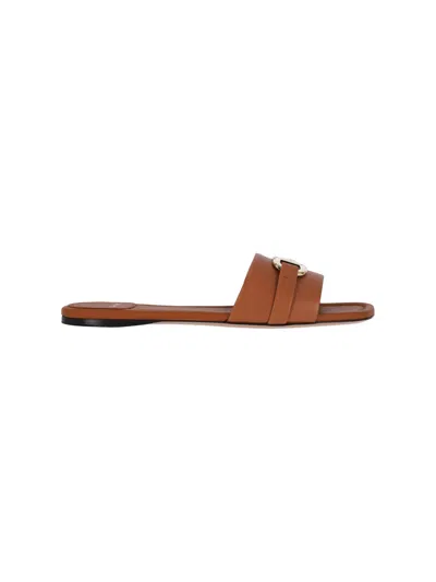 Ferragamo Leather Flat Sandals With Logo In Brown
