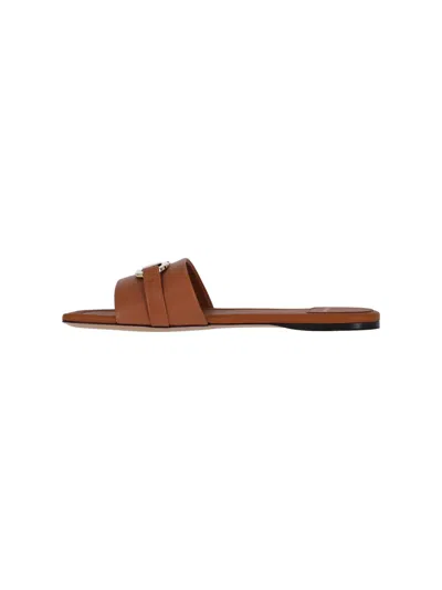 Ferragamo Leather Flat Sandals With Logo In Brown