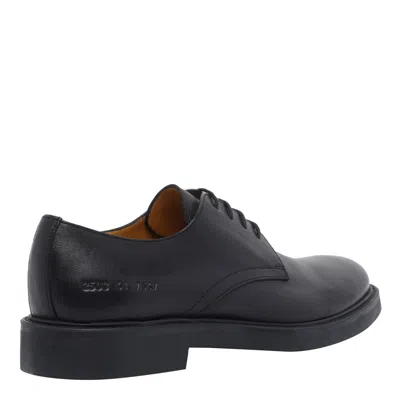 Common Projects Officer Style Lace Up Brogues In Black