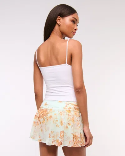Abercrombie & Fitch Mid Rise Asymmetrical Flirty Ruched Mini Skort In White
