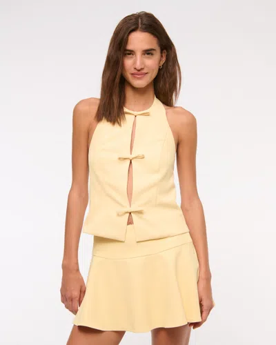 Abercrombie & Fitch High Rise Flirty Drop-waist Mini Skort In Yellow