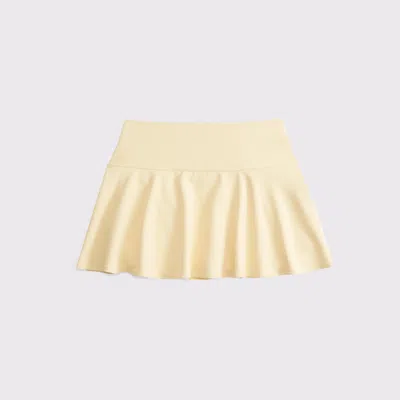 Abercrombie & Fitch High Rise Flirty Drop-waist Mini Skort In Yellow