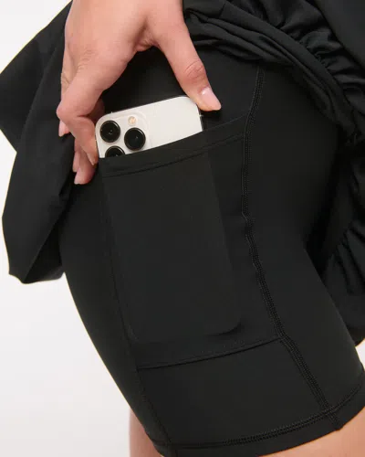 Abercrombie & Fitch Ypb Motiontek Bubble Hem Mini Skirt In Black