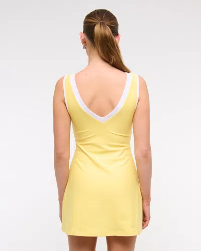 Abercrombie & Fitch Ypb Sculptlux V-neck Mini Dress In Yellow