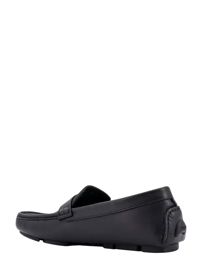 Fendi Round Toe Textured Leather Loafers In Black