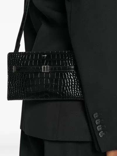 Totême Belted Crocodile-embossed Cross Body Bag In Pink