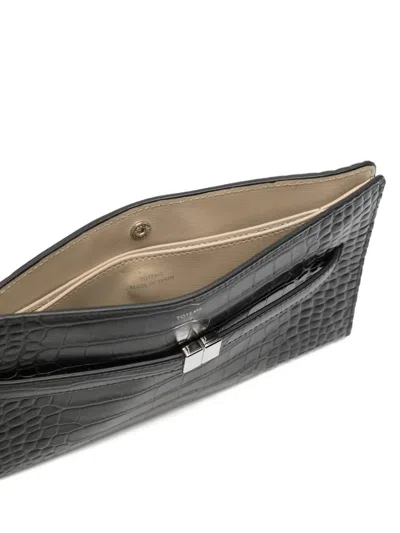 Totême Belted Crocodile-embossed Cross Body Bag In Pink