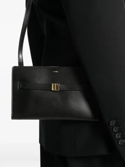 Totême Belted Cross Body Bag In Black