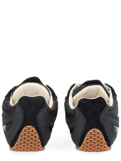 Axel Arigato Slow Runner Black Sneaker With Insert Design And Grooved Sole In Leather And Suede Man In Black