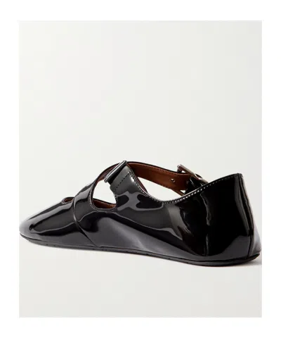 Alaïa Round-head Flat Shoes In Black