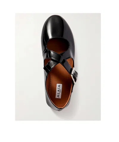 Alaïa Round-head Flat Shoes In Black