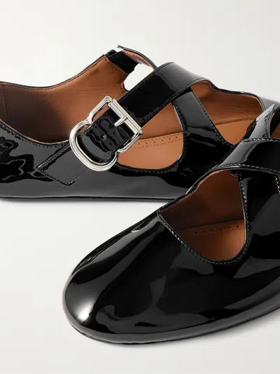 Alaïa Round-head Flat Shoes In Black