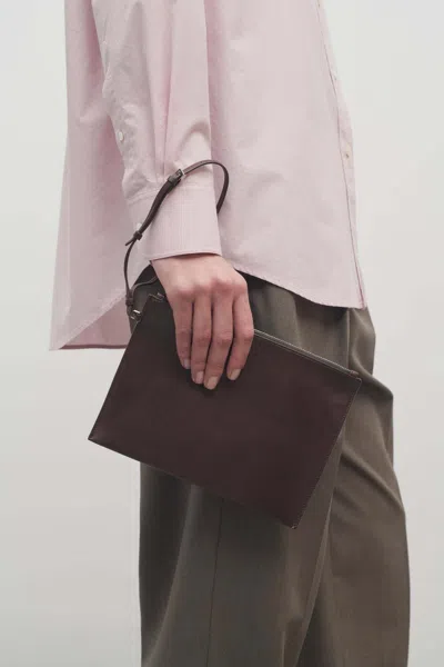 The Row Wristlet Clutch In Black