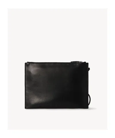 The Row Zipper Wristlet Bag In Black