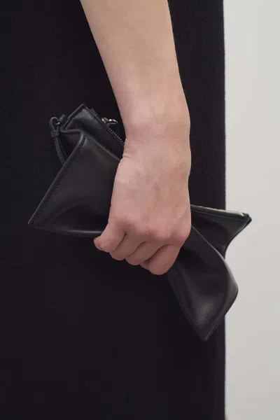 The Row Zipper Wristlet Bag In Black