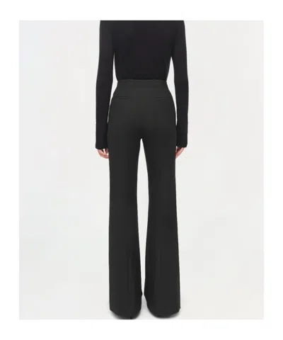 Simkhai Robin Button-embellishment Trousers In Black