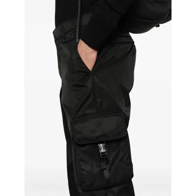 Prada Logo-plaque Trousers In Black