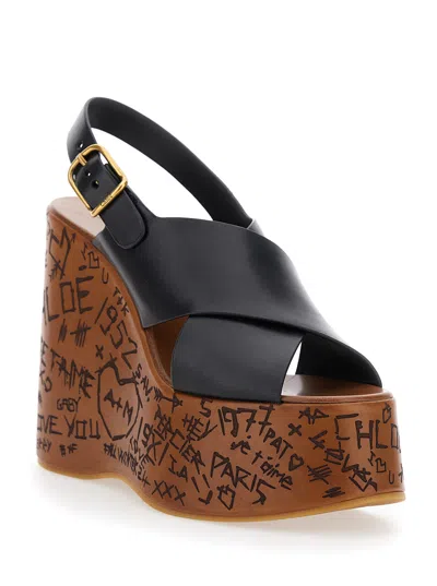 Chloé Women 'maxime' Black Wedges With High Embossed High Wedge Heel And Crossover Strap On The Toe  In Multi