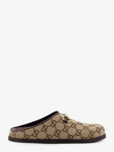 Gucci Gg Monogram Horsebit Flat Mules In Brown