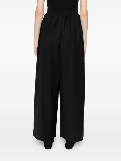Totême Wool Drawstring Trousers In Black