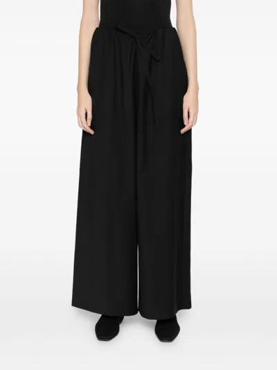 Totême Wool Drawstring Trousers In Black