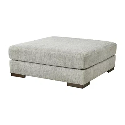 Signature Design By Ashley Regent Park Cushioned Upholstered Ottoman In Gray
