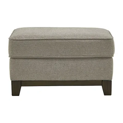 Signature Design By Ashley Kaywood Cushioned Upholstered Ottoman In Gray