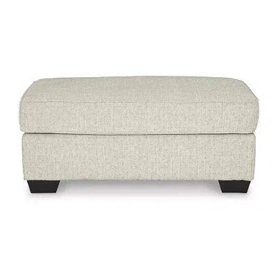 Signature Design By Ashley Heartcort Ottoman In Sand