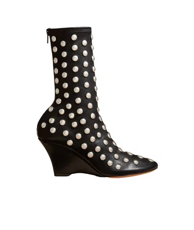 Khaite The Apollo Studded Wedge Boots In Black