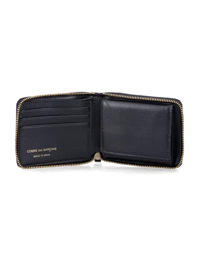 Comme Des Garçons Embossed Logotype Wallet In Black
