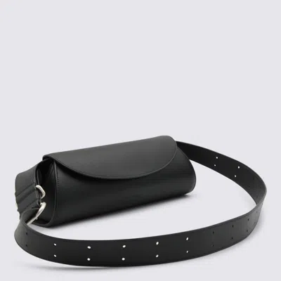 Jil Sander Cannolo Logo Embossed Small Shoulder Bag In Black