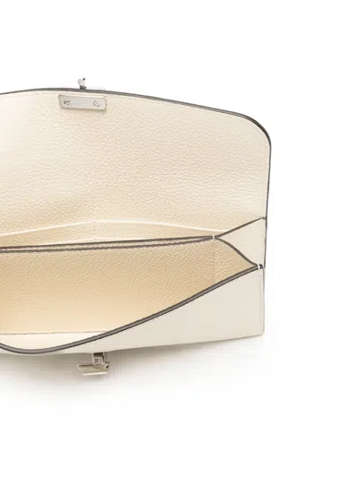 Totême T-lock Leather Wallet In Blue