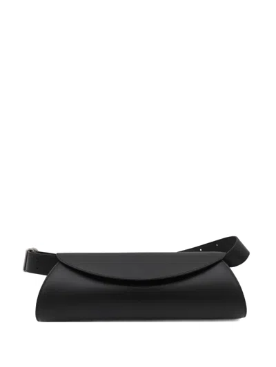 Jil Sander Cannolo Logo Embossed Small Shoulder Bag In Black