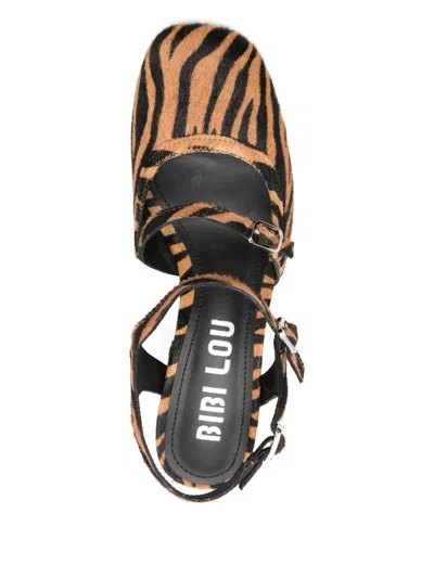 Bibi Lou 85mm Buckle-fastening Pumps In Animal Print