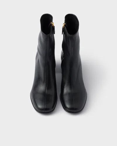 Prada 55mm Leather Zip-fastening Block-heel Boots In Animal Print