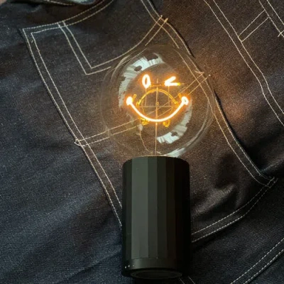 Mitb Smiley World Kidness Portable Table Lamp In Gold