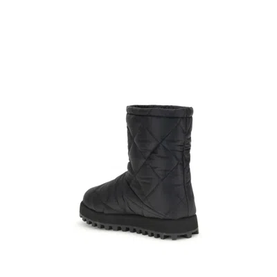 Dolce & Gabbana Quilted Boots In Black