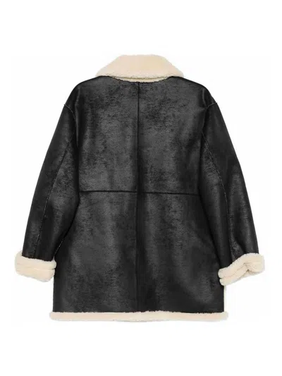 Dunst Reversible Unisex Shearling Jacket In Black