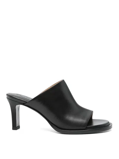Tod's Mules In Leather In Black