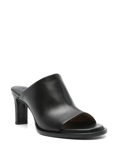Tod's Mules In Leather In Black