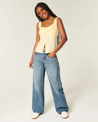 Hollister Low-rise Medium Wash Los Angeles Graphic Baggy Jeans In Yellow