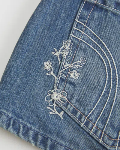 Hollister Ultra Low-rise Medium Wash Floral Embroidered Denim Mini Shorts In Blue
