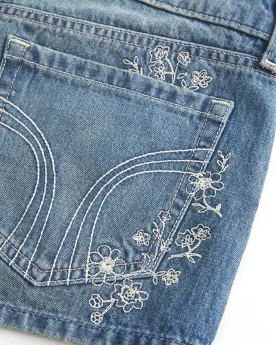 Hollister Ultra Low-rise Medium Wash Floral Embroidered Denim Mini Shorts In Blue
