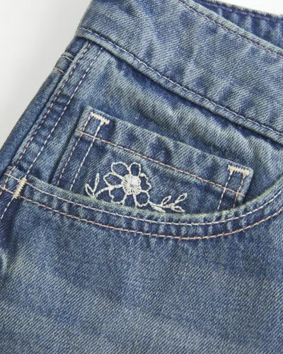 Hollister Ultra Low-rise Medium Wash Floral Embroidered Denim Mini Shorts In Blue