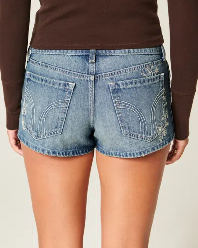 Hollister Ultra Low-rise Medium Wash Floral Embroidered Denim Mini Shorts In Blue