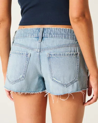 Hollister Ultra Low-rise Ripped Medium Wash Mini Denim Shorts In Blue