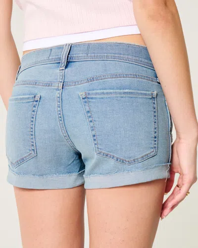 Hollister Low-rise Ripped Light Wash Denim Shortie Shorts In Blue