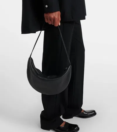 The Row Izzy Small Crescent Shoulder Bag In Leather In Black