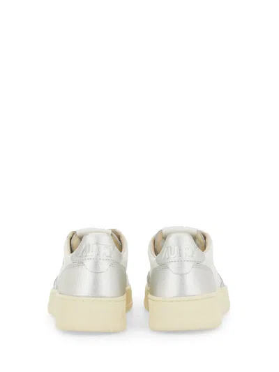 Autry Medalist Low Two-tone Sneakers In White And Metallic Silver Leather In Multi